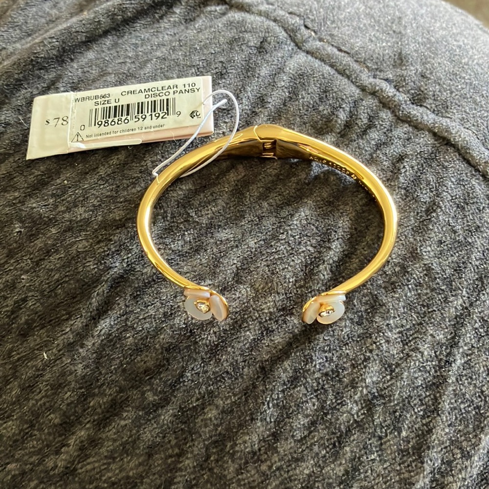 Kate spade beautiful gold bangle.New comes without box however